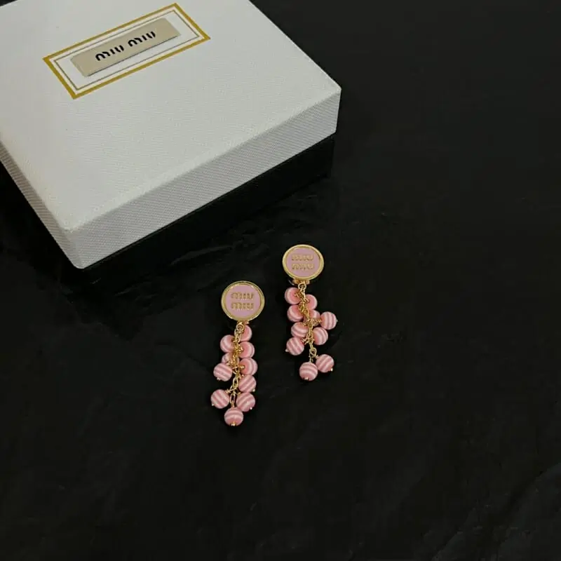 miu miu boucles doreilles pour femme s_12240511